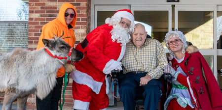 Immanuel resident visited by Santa, Mrs.Claus, and a live reindeer