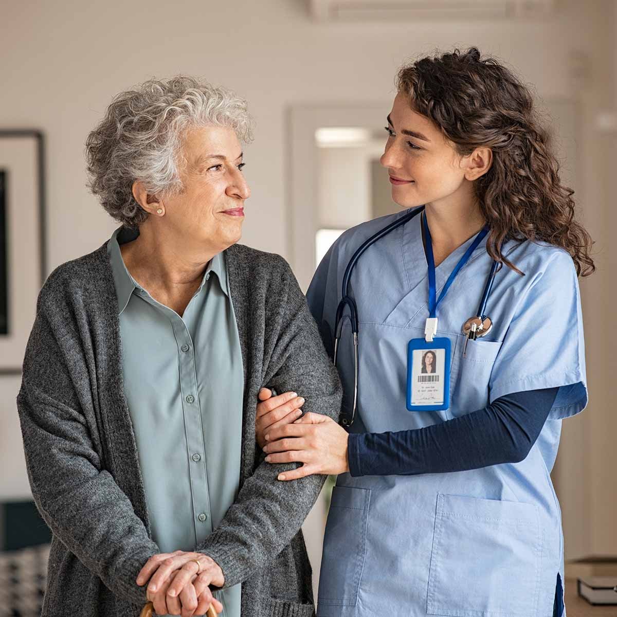 An Immanuel Pathways employee greets a PACE® participant. 