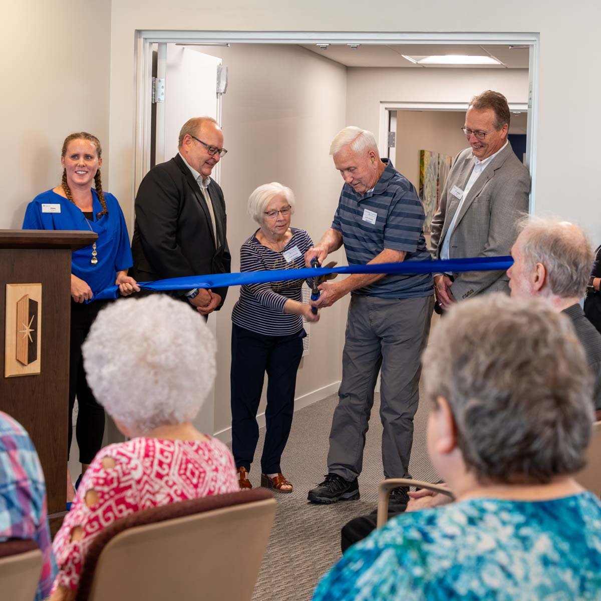 The ribbon cutting at the open house of Graceview Courtyard's new addition.