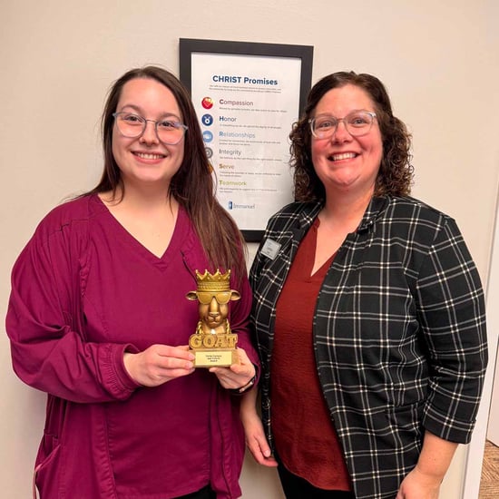 Bee Leone is recognized with the Just Culture G.O.A.T. Award at Trinity Village.