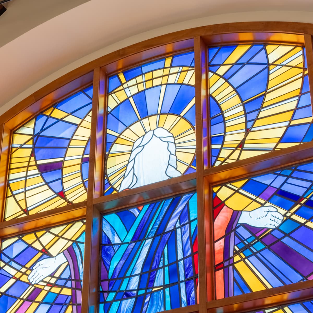 Large stained glass window in a church.