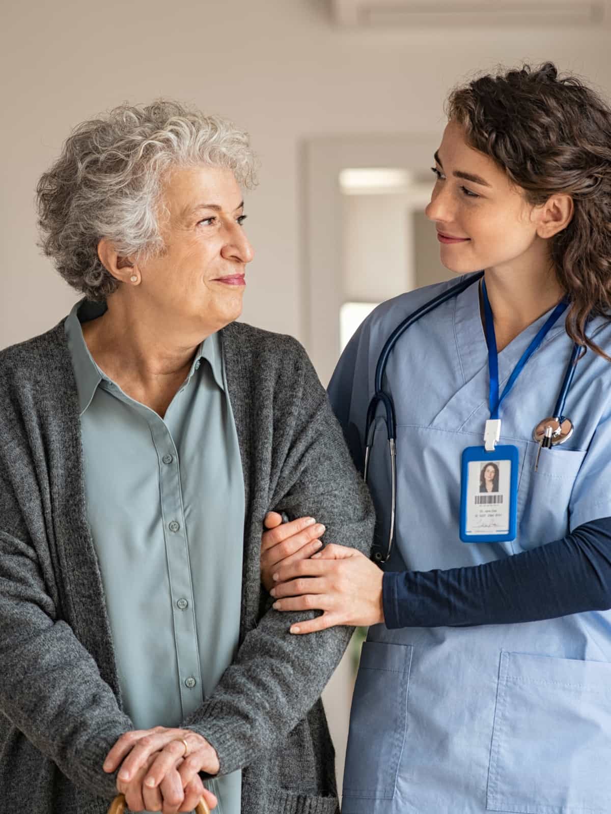 Nurse helping an assisted living resident.