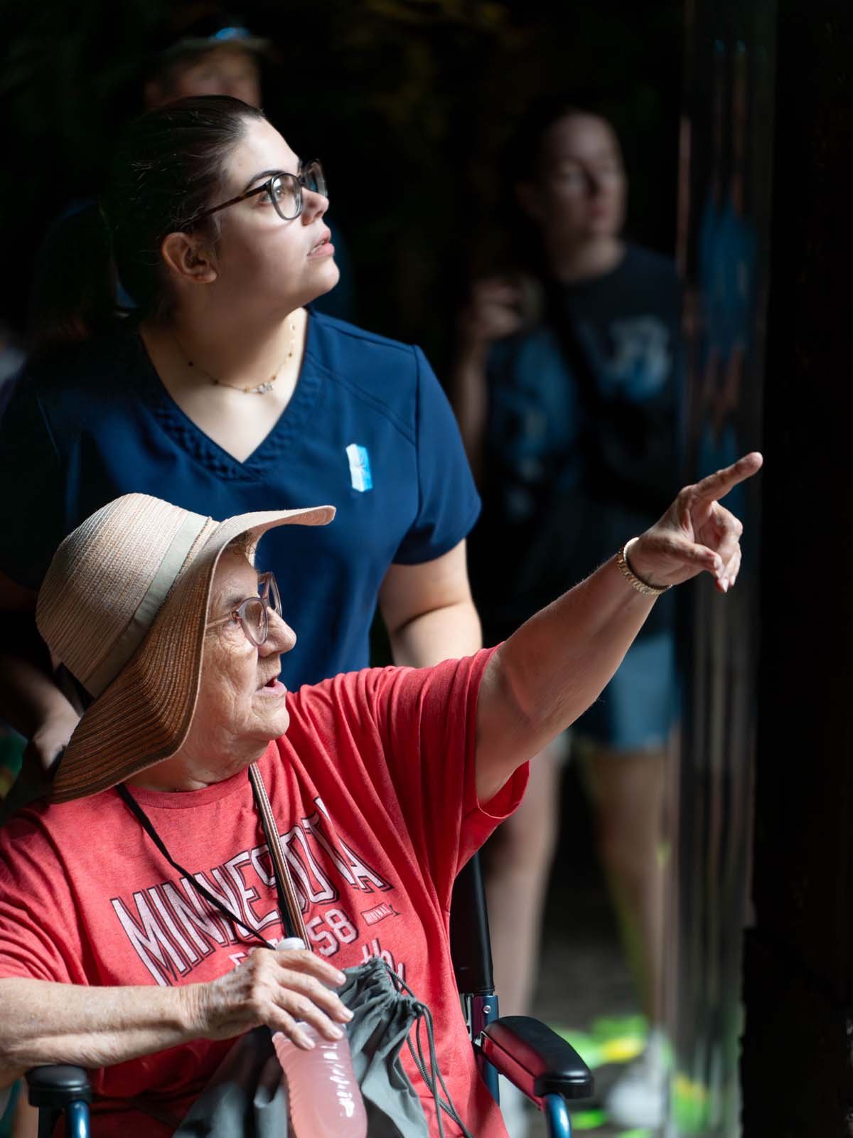 A participant and staff member from Immanuel Pathways visit the zoo.