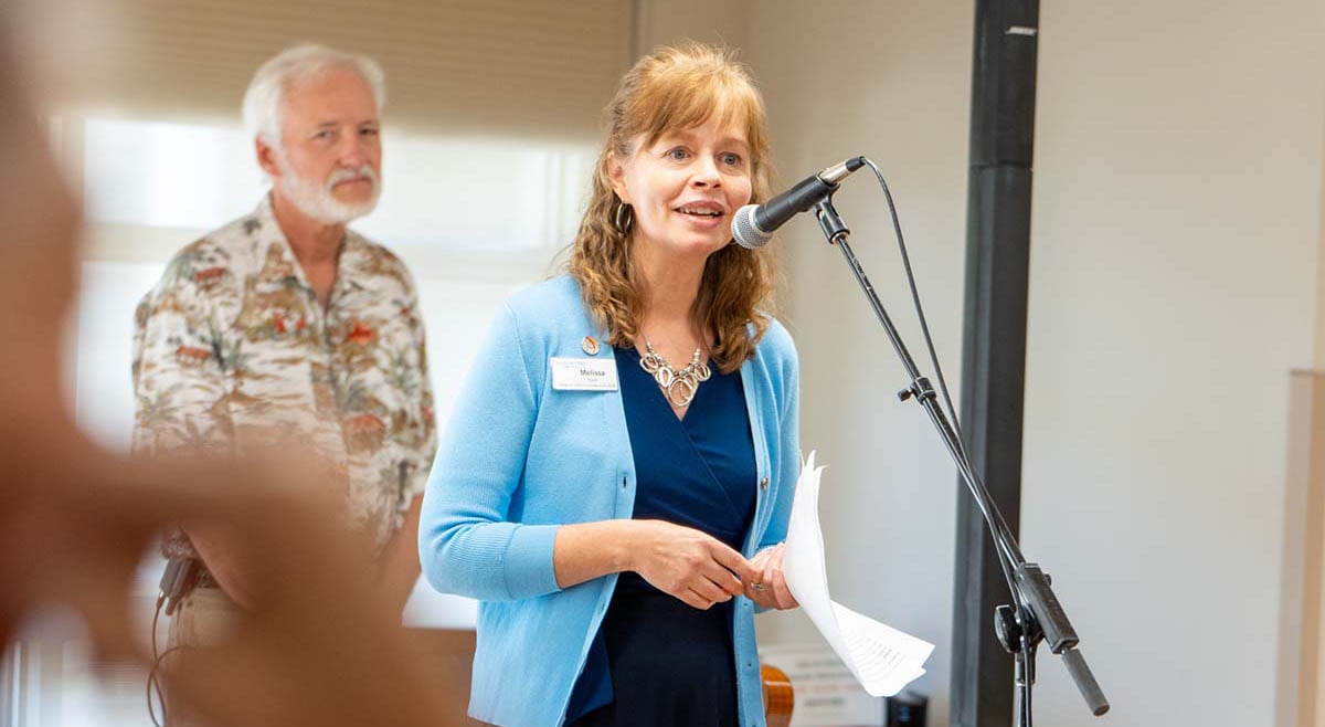 An Immanuel executive director presents to her community at an event.