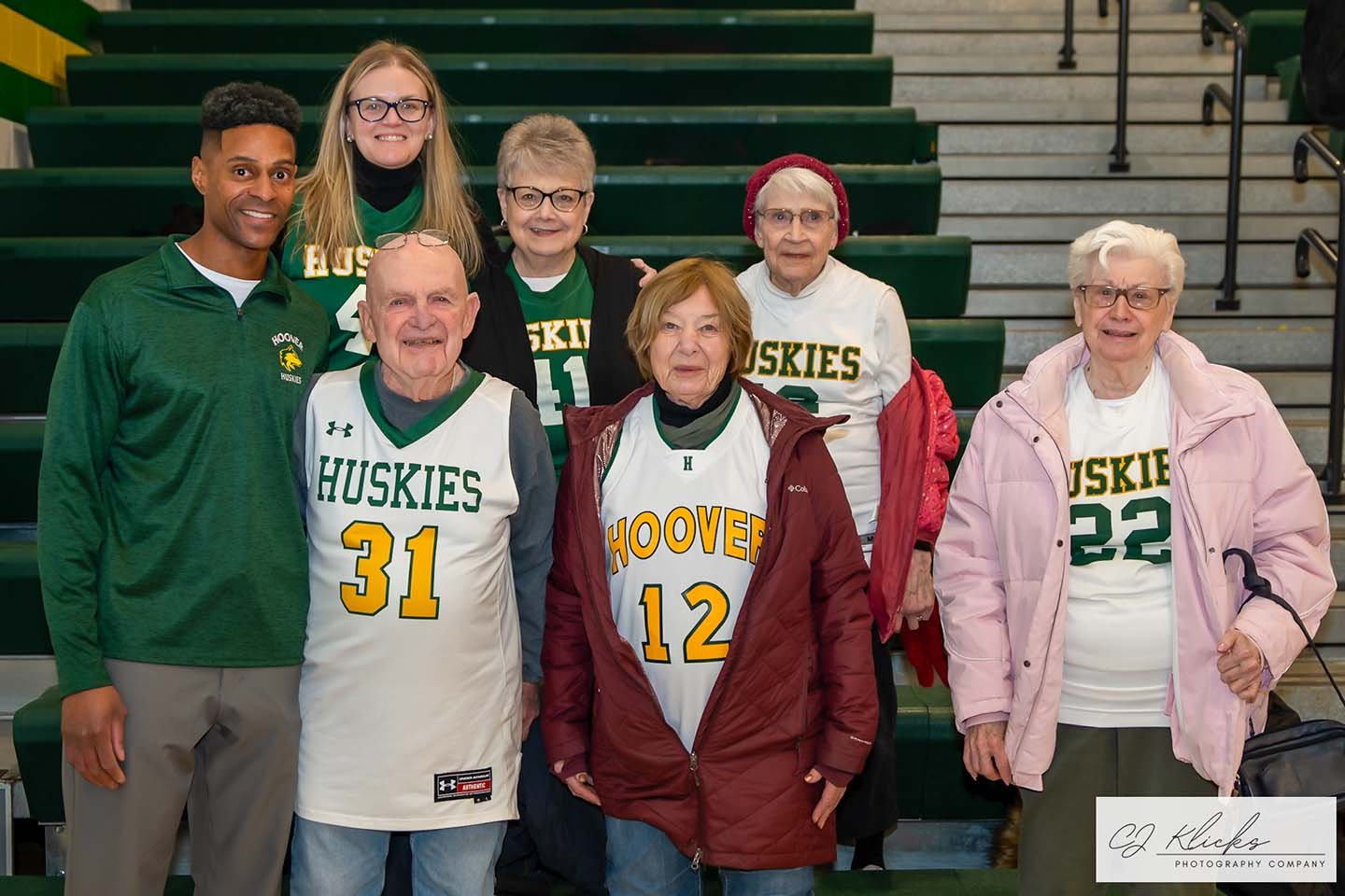 Photo by CJ Klicks Photography® - Deerfield retirement living community residents cheer on the Hoover High School boys basketball team.