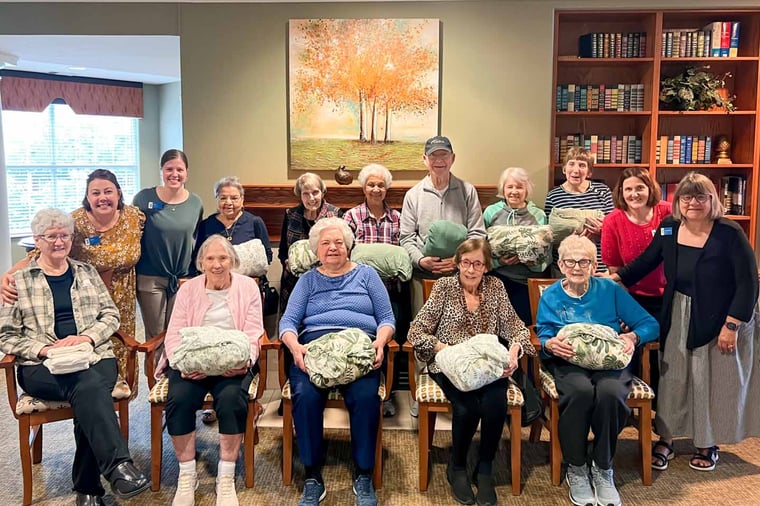 Residents and employees at The Landing celebrate National Assisted Living Week.