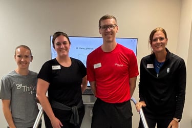 Members of Immanuel Village's wellness team gather to celebrate the installation of their Dividat Senso system.