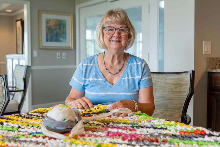Residents at Pacific Springs in Omaha transform recycled plastic bags into sleeping mats for people experiencing homelessness.