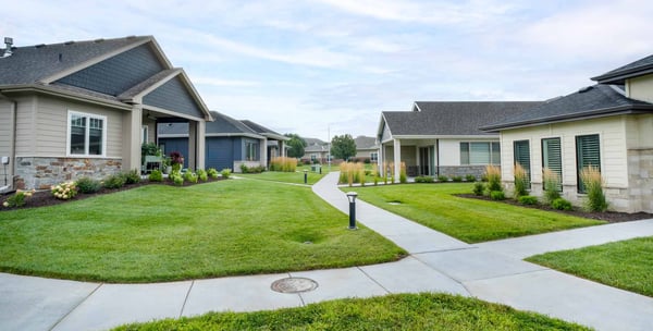 Woman smiling while playing pickleball.