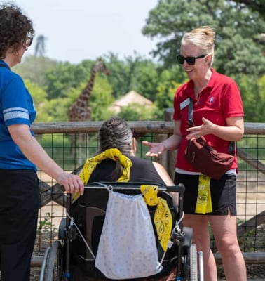 An Immanuel Pathways employees talks with a a PACE® participant while visiting the zoo. 