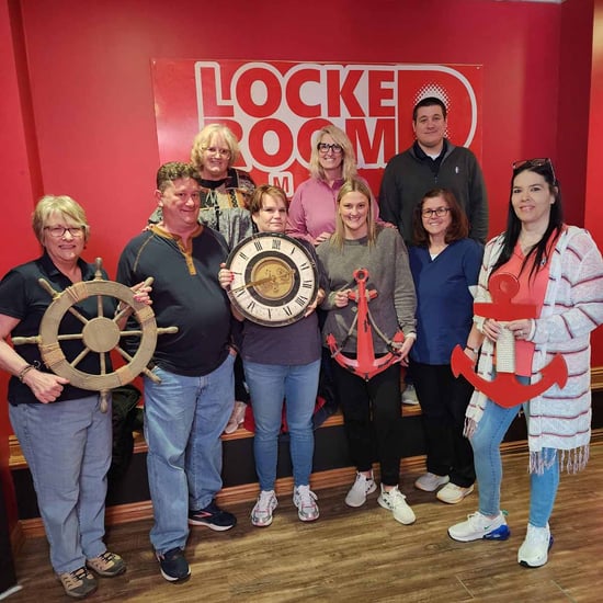 The leadership team from The Lighthouse and Lakeside at the Locked Room Omaha.