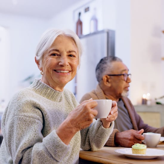 A group of seniors have coffee and discuss retirement.
