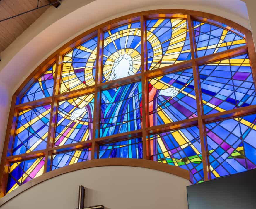 Stained glass window in a community chapel. 