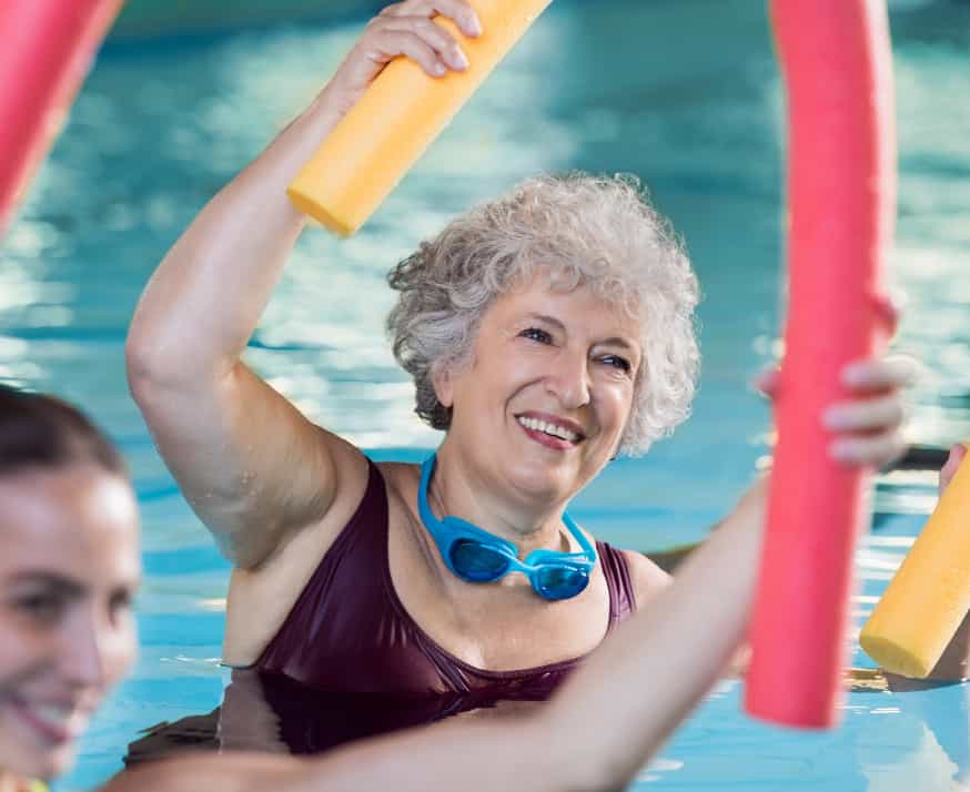 Senior woman doing aqua aerobics.